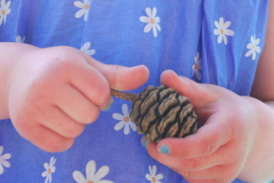 Cropped image of woman holding hands