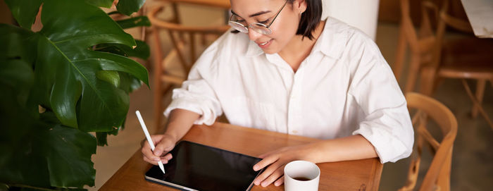 Young woman using mobile phone