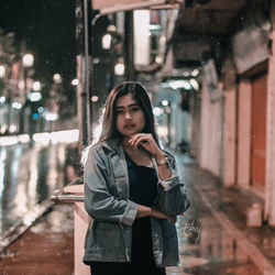 Young woman on street in city during winter