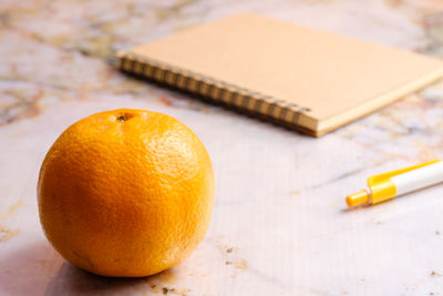 High angle view of orange on table