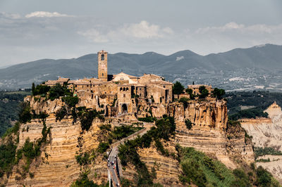 View of castle on mountain against sky