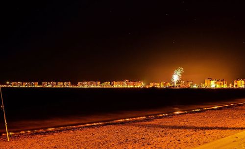 View of illuminated cityscape at night