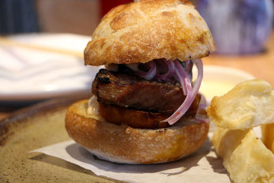 Close-up of burger served on plate