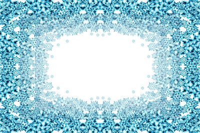 Digital composite image of plants against blue sky
