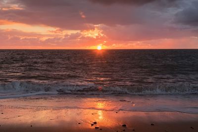 View of calm sea at sunset