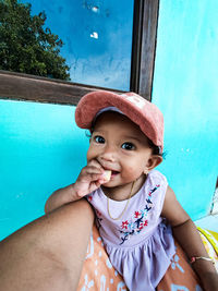 Portrait of cute girl in swimming pool