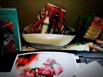 High angle view of paintbrushes in container on table