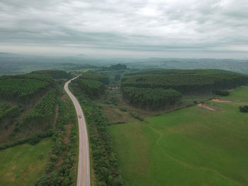 High angle view of road amidst landscape against sky