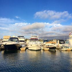 Boats moored in sea