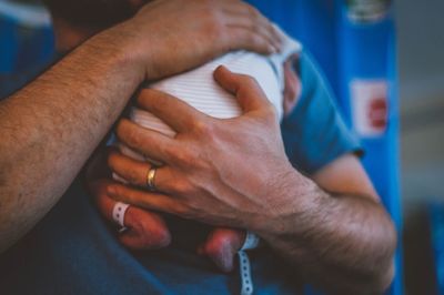 Cropped image of woman holding hands