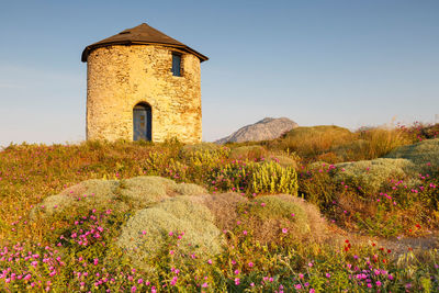 Old traditional windmill on the main island of fournoi korseon.