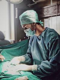 Surgeon picking tools at operating room