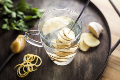 Close-up of cocktail in glass on table