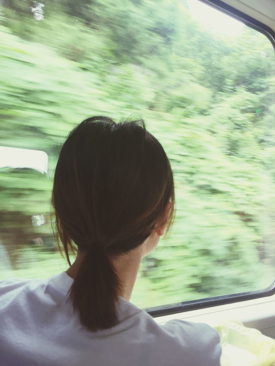 headshot, water, lifestyles, leisure activity, head and shoulders, rear view, young adult, transparent, day, close-up, person, young women, long hair, window, sunlight, waist up, focus on foreground, blond hair