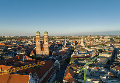 Wonderful sunset shining onto the frauenkirche towers in munich, germany