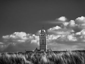 White church behind the dunes in katwijk aan zee netherland