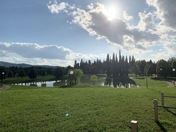 Panoramic view of field against sky