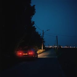 Cars on road at night