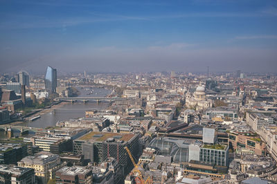 High angle view of buildings in city against sky