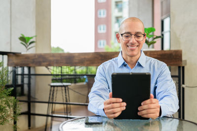 Young man using digital tablet