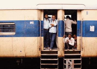 People standing on railroad track