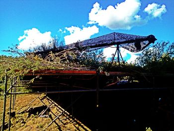 Low angle view of built structure against blue sky