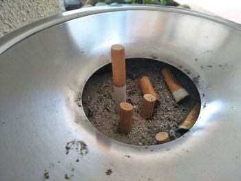 High angle view of cigarette in container