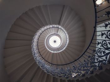 Low angle view of spiral staircase in building