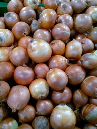 Full frame shot of onions for sale at market