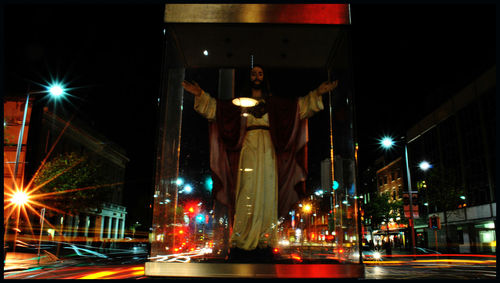 Illuminated street light at night