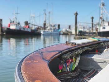 Boats moored at harbor