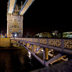 Bridge over river at night