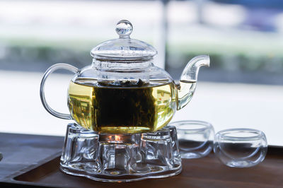 Close-up of tea in glass on table