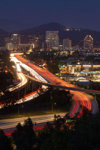 High angle view of light trails on city street at night