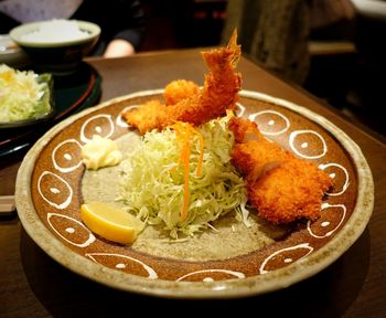 Close-up of food served on table