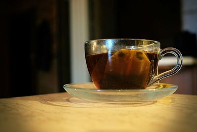 Close-up of coffee cup on table