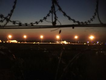 View of illuminated street light at night