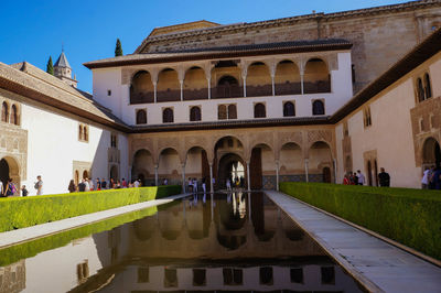 People at historical building