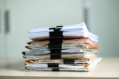 Close-up of stack on table