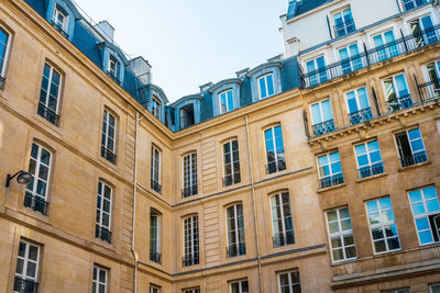 Low angle view of buildings against sky