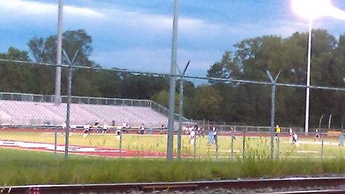 Soccer field with trees in background