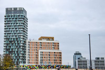 Low angle view of skyscrapers against sky