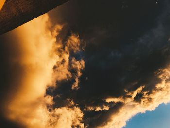 Low angle view of dramatic sky during sunset