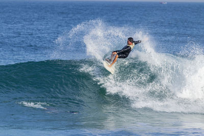 Man surfing in sea