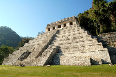 Low angle view of old ruins against clear sky