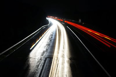 Light trails on road at night