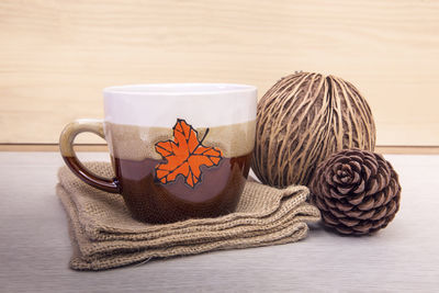 Close-up of coffee cup on table