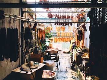 Meat hanging in butcher shop for sale