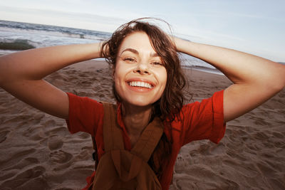 Portrait of young woman at beach