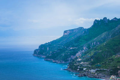 Scenic view of bay against sky